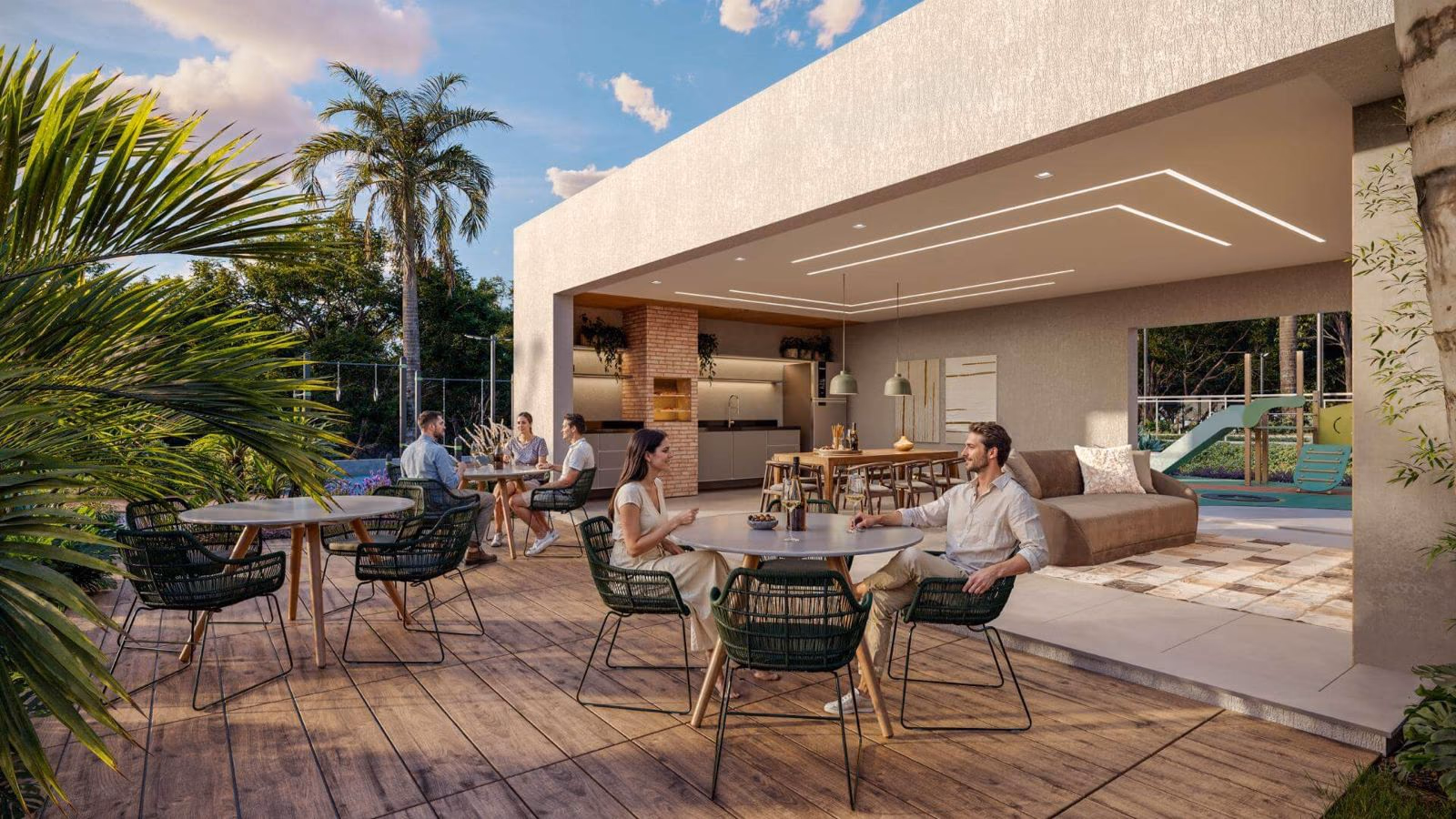 Espaço gourmet com churrasqueira e mesas no deck